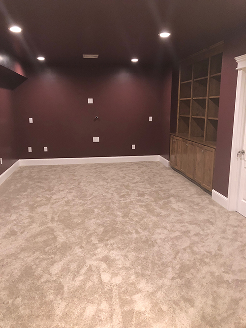 basement room with cabinets