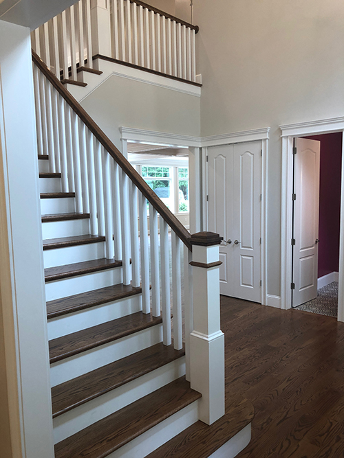 Stairwell with wood floors