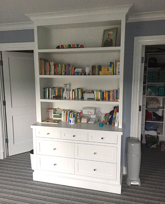 built in book shelf with drawers